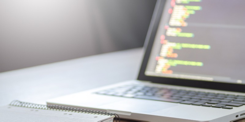 Tidy Desk with laptop, ntepd and cofee